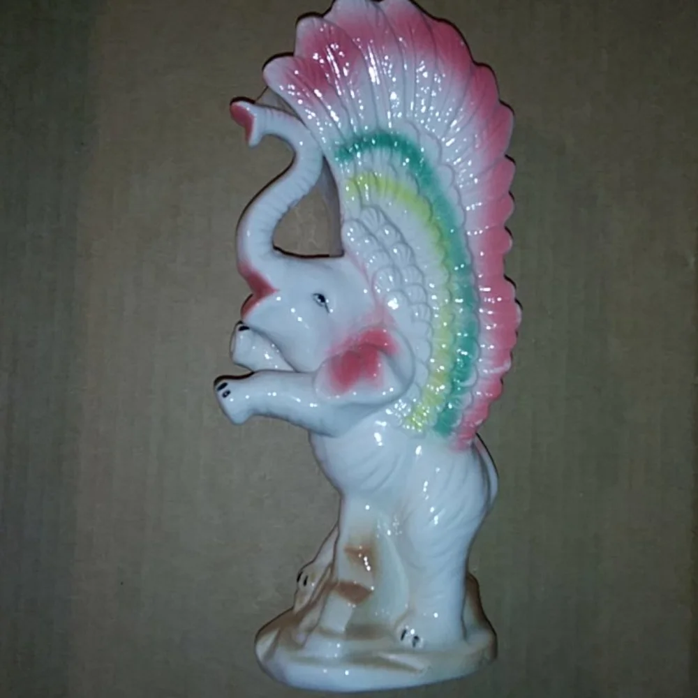 Vintage vase elephant with wings